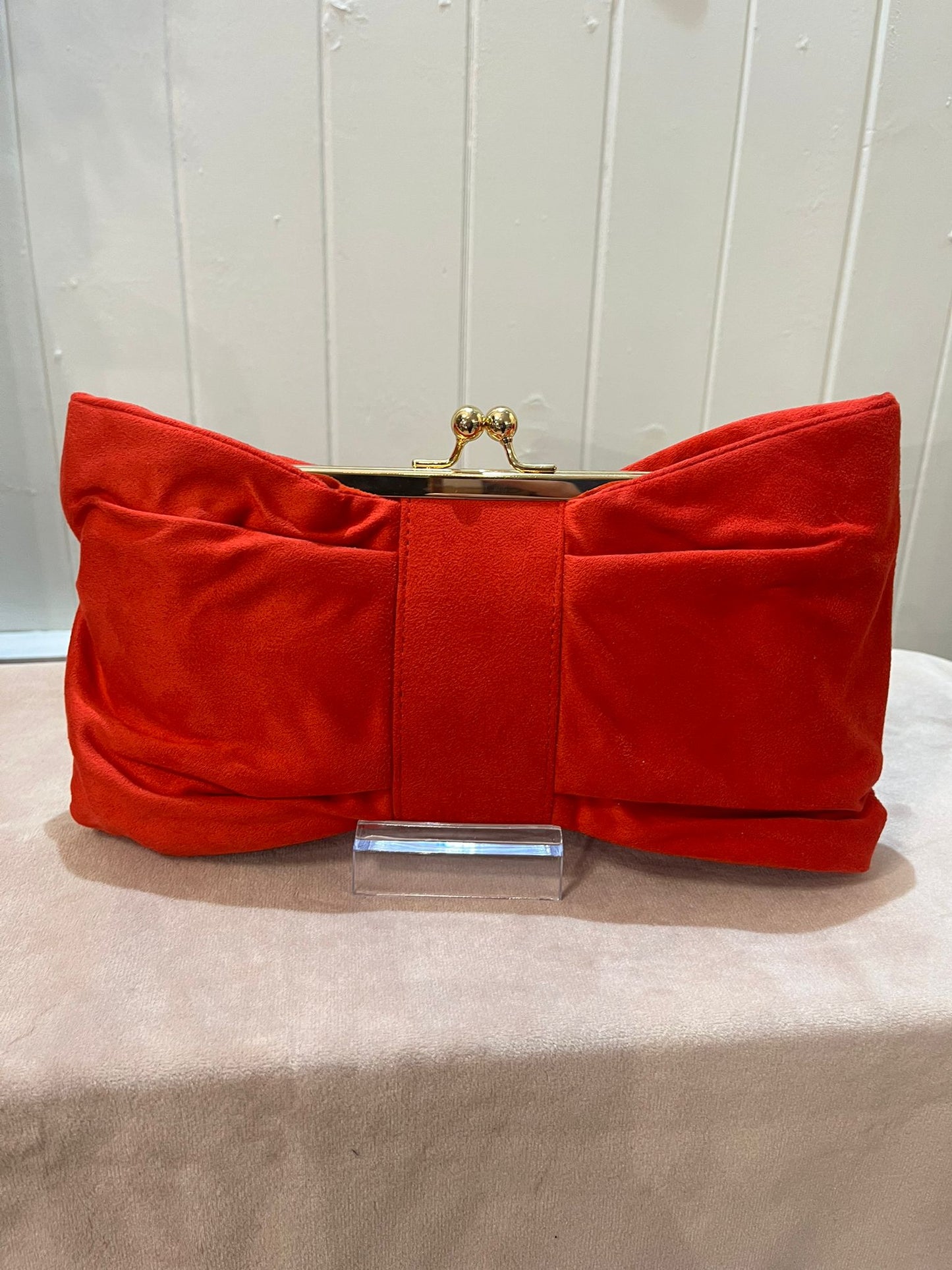 Red clutch bag